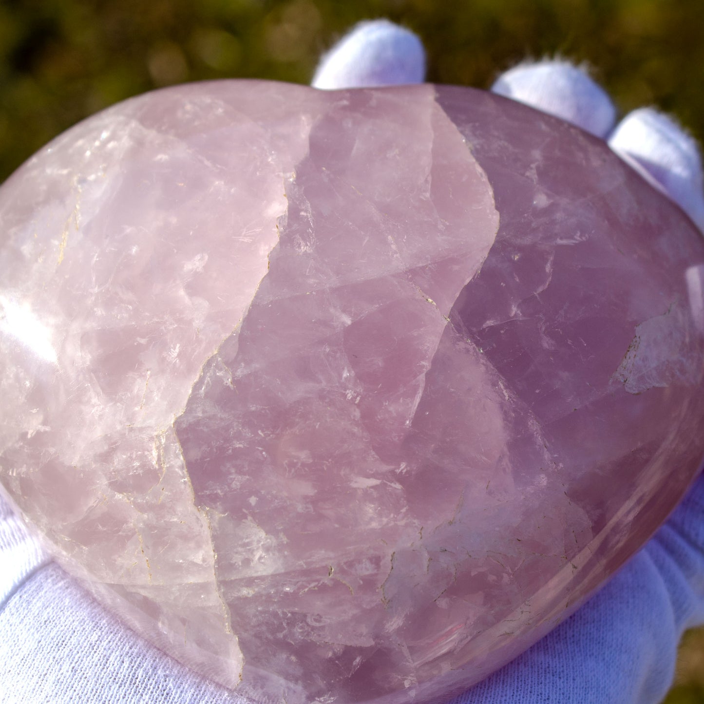 rose quartz heart polished carving close up