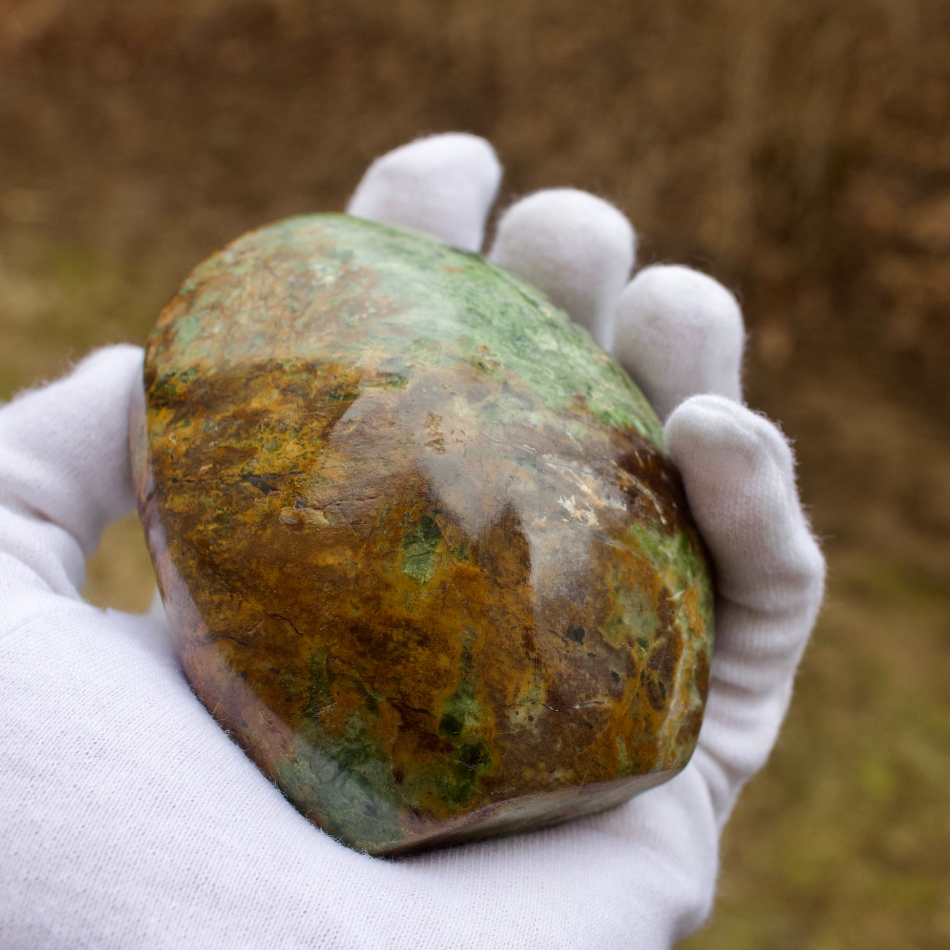 polished hand held chrysoprase