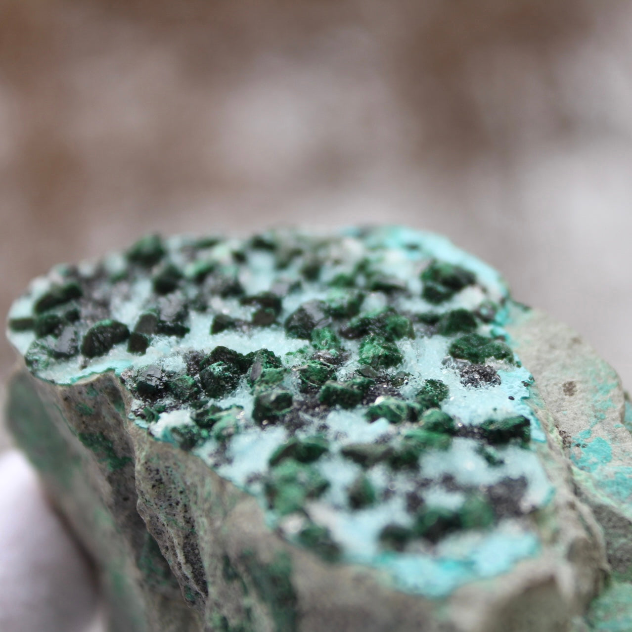 up close of green flecks malachite chrysocolla