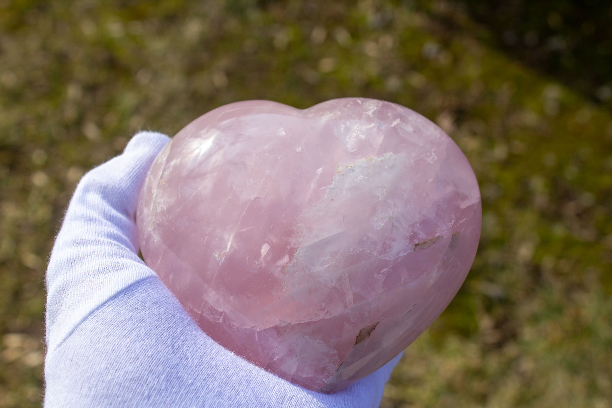 rose quartz heart polished carving handheld front