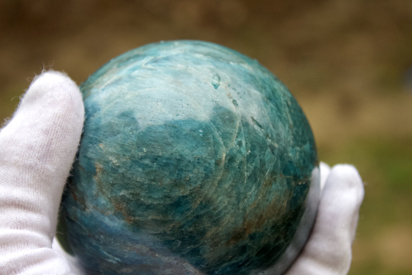 polished blue apatite sphere concentric rings