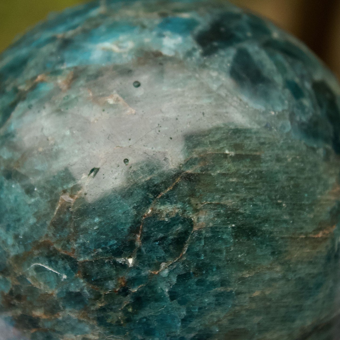 polished blue apatite sphere close up